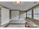 Versatile bonus room featuring tile floors and natural light at 10195 Brier Mill Ct, Alpharetta, GA 30022