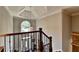 Elegant foyer with a view of the front door, high ceilings, and chandelier at 10195 Brier Mill Ct, Alpharetta, GA 30022