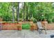 Stone paved patio with beautiful landscaping at 10195 Brier Mill Ct, Alpharetta, GA 30022