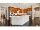 Beautiful kitchen with custom cabinetry, a large island, and stainless steel appliances at 1382 Murrays Loch Nw Pl, Kennesaw, GA 30152