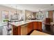 Well-designed kitchen open to the dining area and sunroom, perfect for entertaining at 1382 Murrays Loch Nw Pl, Kennesaw, GA 30152