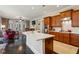 Spacious kitchen with a large island and easy access to the living area at 1382 Murrays Loch Nw Pl, Kennesaw, GA 30152