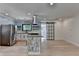 Modern kitchen with stainless steel appliances and floral island at 4237 Rickenbacker Ne Way, Atlanta, GA 30342