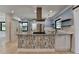 Bright kitchen with granite countertops, stylish backsplash, and stainless steel appliances at 4237 Rickenbacker Ne Way, Atlanta, GA 30342