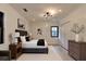Cozy main bedroom with a stylish bed, modern lighting, and ample closet space at 4237 Rickenbacker Ne Way, Atlanta, GA 30342