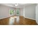 Bright bedroom with hardwood floors and large windows providing natural light at 125 Franklin Pl, Atlanta, GA 30342