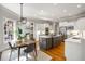 Bright, open kitchen with a center island, stainless steel appliances, and an adjacent dining area at 125 Franklin Pl, Atlanta, GA 30342