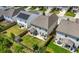 An aerial view of the home, fenced-in backyard, and community neighborhood at 1570 Ribbon Mill Sw Ln, Mableton, GA 30126