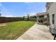 A view of the home's backyard with a storage shed and lawn at 1570 Ribbon Mill Sw Ln, Mableton, GA 30126
