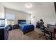 Comfortable carpeted bedroom with a ceiling fan, window, and closet at 1570 Ribbon Mill Sw Ln, Mableton, GA 30126