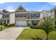 Beautiful two-story home with a well-maintained lawn, covered porch, and attached two-car garage at 1570 Ribbon Mill Sw Ln, Mableton, GA 30126