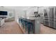 Spacious kitchen with modern appliances, a large island with seating, and an open layout at 1570 Ribbon Mill Sw Ln, Mableton, GA 30126