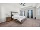 Large main bedroom featuring a trey ceiling, ceiling fan, and ample natural light at 1570 Ribbon Mill Sw Ln, Mableton, GA 30126