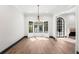 Bright dining area features chandelier, bay window and door to another room at 650 Moores Mill Nw Rd # 1, Atlanta, GA 30327