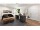 Well-lit home office featuring a desk, comfortable seating, and art-adorned walls, creating an inspiring workspace at 650 Moores Mill Nw Rd # 1, Atlanta, GA 30327