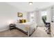 Well-lit bedroom with neutral tones, providing a calming and comfortable retreat at 1316 Willamette Way, Marietta, GA 30008