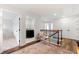 Second floor hallway leading to a laundry room, bedrooms and bathroom at 1316 Willamette Way, Marietta, GA 30008