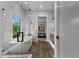 Bright bathroom with walk-in shower and soaker tub at 185 Central Ave, Fayetteville, GA 30214
