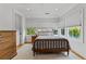 Serene bedroom with natural light, comfortable queen bed, and plush rug at 185 Central Ave, Fayetteville, GA 30214
