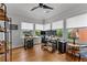 Sunlit office space boasts wood floors, many windows, and backyard views at 185 Central Ave, Fayetteville, GA 30214