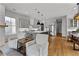 Open concept living space with kitchen, dining and living room plus modern decor at 185 Central Ave, Fayetteville, GA 30214