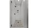 Stylish shower features white tile, matte black hardware, and a mosaic tile floor at 185 Central Ave, Fayetteville, GA 30214