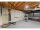 Workout area in basement with mounted equipment and rubber mat flooring at 220 Hollyridge Dr, Roswell, GA 30076