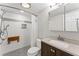 Modern bathroom with a spacious shower, updated vanity, and a neutral color palette at 220 Hollyridge Dr, Roswell, GA 30076