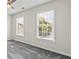 Spacious bedroom with natural light from large windows, and neutral carpeting at 2873 Hilton Nw Cir, Kennesaw, GA 30152