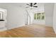 Bedroom featuring hardwood floors, large window and access to the bathroom at 2922 Parkridge Ne Dr, Brookhaven, GA 30319