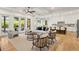 Open-concept living room features abundant natural light, stylish furniture, and seamless access to the outdoors at 2922 Parkridge Ne Dr, Brookhaven, GA 30319