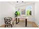 Bright home office with modern desk, chair, neutral rug, and natural light at 2922 Parkridge Ne Dr, Brookhaven, GA 30319