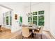 Cozy dining area with natural light and backyard view at 3088 Hidden Falls Dr, Buford, GA 30519