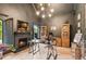 Sophisticated office with fireplace, custom built-ins, and ample natural light at 3088 Hidden Falls Dr, Buford, GA 30519