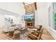 Cozy living room with stone fireplace and comfortable seating arrangement at 3088 Hidden Falls Dr, Buford, GA 30519