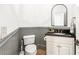 Powder room featuring classic fixtures and bright natural light at 3088 Hidden Falls Dr, Buford, GA 30519