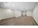 Spacious basement with wood-look flooring, recessed lighting, and neutral walls at 4544 Cavallon Nw Way, Acworth, GA 30101