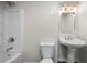 Bathroom with a pedestal sink, a shower, and a bathtub at 4544 Cavallon Nw Way, Acworth, GA 30101