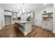Spacious kitchen with a large island, modern appliances, and ample storage at 4544 Cavallon Nw Way, Acworth, GA 30101