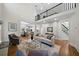 Bright and open living room with a soaring ceiling and natural light at 4544 Cavallon Nw Way, Acworth, GA 30101