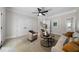 Relaxing living room with natural light, comfortable seating, ceiling fan and stylish decor at 4544 Cavallon Nw Way, Acworth, GA 30101