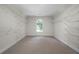 Spacious walk-in closet with an arched window and wire shelving at 4544 Cavallon Nw Way, Acworth, GA 30101