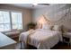 Bedroom with queen bed, hardwood floors, and natural lighting at 37 La Rue Nw Pl, Atlanta, GA 30327