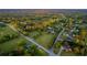 Scenic aerial view of neighborhood showing lush greenery, and beautiful homes at 3700 Tom Brewer Rd, Loganville, GA 30052