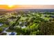 Aerial view of a neighborhood showcasing homes with lush, green surroundings at 3700 Tom Brewer Rd, Loganville, GA 30052