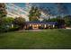Beautiful single-story brick home with a well-manicured lawn at 3700 Tom Brewer Rd, Loganville, GA 30052