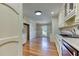 Bright kitchen with ample cabinet storage, granite counters, and modern appliances at 3700 Tom Brewer Rd, Loganville, GA 30052