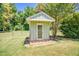 Backyard shed with a door providing extra storage or workspace at 3700 Tom Brewer Rd, Loganville, GA 30052