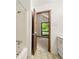 An ensuite bathroom with a bathtub, door to the bedroom, and vanity at 70 Juliana Dr, Ellenwood, GA 30294