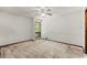 Bedroom featuring ceiling fan, window, and trim detail at 70 Juliana Dr, Ellenwood, GA 30294